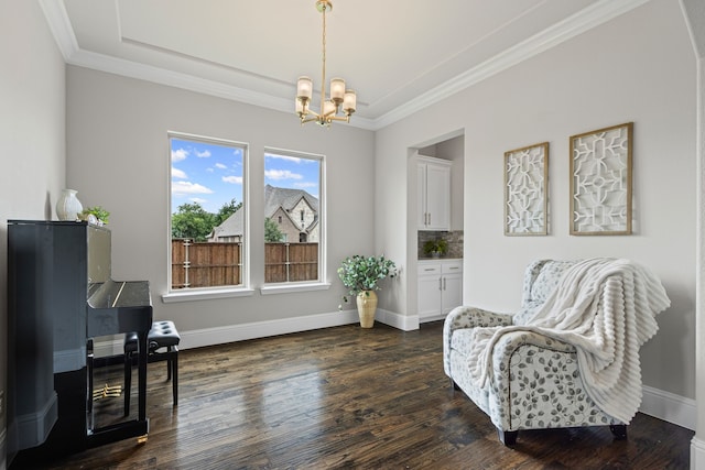 309 Red River Cir Trail, Highland Village, TX 75077 - sitting room with a chandelier, crown molding, dark wood-style floors, and a tray ceiling