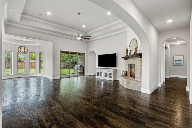 309 Red River Cir Trail, Highland Village, TX 75077 - unfurnished living room with ceiling fan, a stone fireplace, wood finished floors, a raised ceiling, and recessed lighting