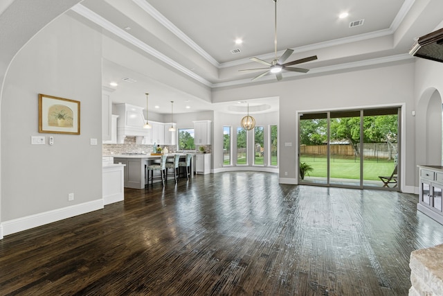 309 Red River Cir Trail, Highland Village, TX 75077 - living room featuring ceiling fan, dark wood-style flooring, a tray ceiling, ornamental molding, and recessed lighting
