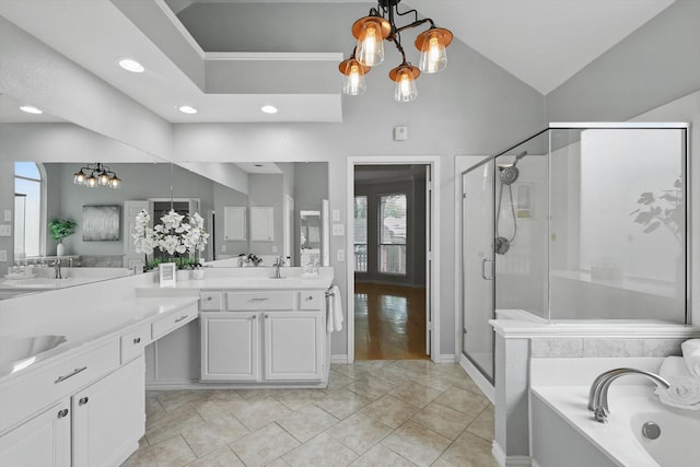 2402 Pittsburg Lndg, Mesquite, TX 75181 - bathroom with a chandelier, a stall shower, double vanity, a bath, and lofted ceiling
