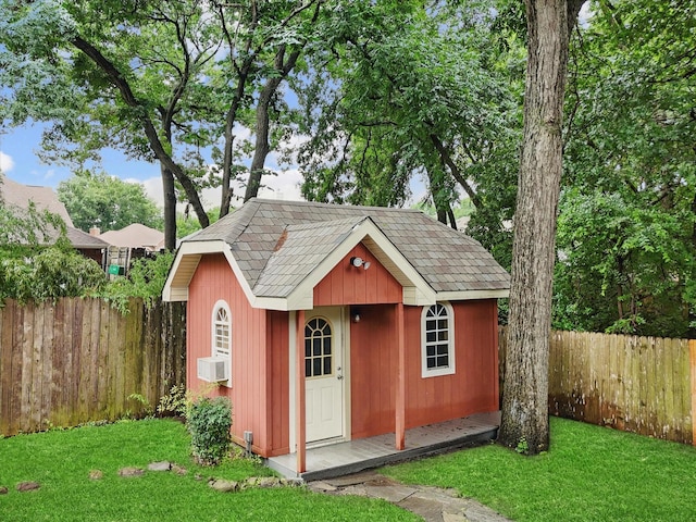 2402 Pittsburg Lndg, Mesquite, TX 75181 - view of outbuilding featuring a fenced backyard and cooling unit