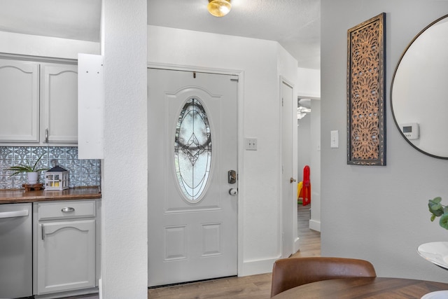 10917 Caldwell Ln, Fort Worth, TX 76179 - foyer featuring light wood finished floors and baseboards
