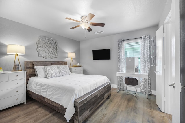 10917 Caldwell Ln, Fort Worth, TX 76179 - bedroom with wood finished floors and a ceiling fan