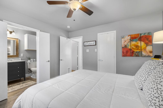 10917 Caldwell Ln, Fort Worth, TX 76179 - bedroom with wood finished floors, ensuite bathroom, and ceiling fan