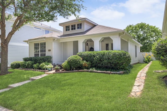 10917 Caldwell Ln, Fort Worth, TX 76179 - view of front of home with a front yard and a shingled roof