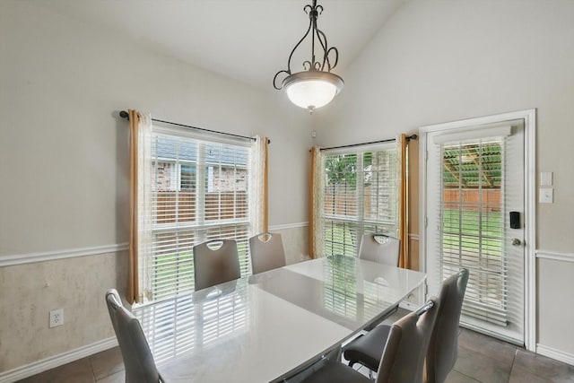 2959 Crystal Way, Grand Prairie, TX 75052 - dining area featuring vaulted ceiling and dark tile patterned floors