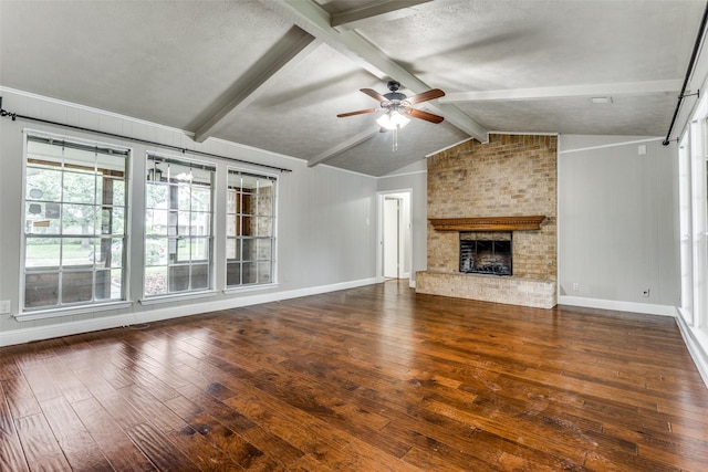 1614 Baltimore Dr, Richardson, TX 75081 - unfurnished living room featuring wood-type flooring, ceiling fan, and a brick fireplace