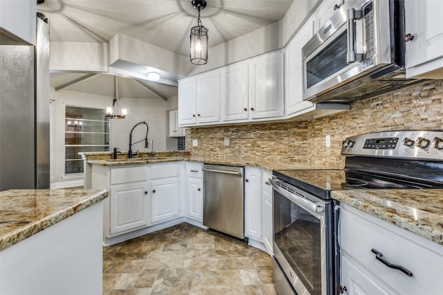 1614 Baltimore Dr, Richardson, TX 75081 - kitchen featuring stainless steel appliances, white cabinetry, and light stone countertops