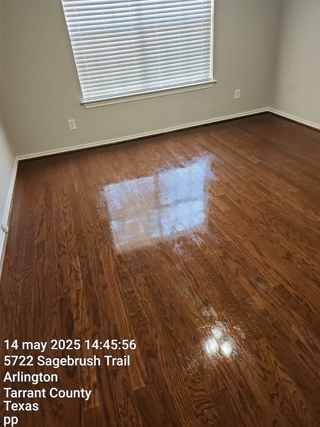 5722 Sagebrush Trl, Arlington, TX 76017 - unfurnished room with dark wood finished floors and healthy amount of natural light