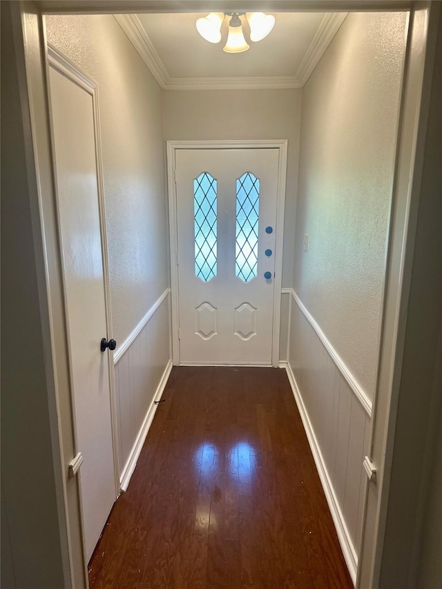 5722 Sagebrush Trl, Arlington, TX 76017 - doorway to outside with wood-type flooring, ornamental molding, a chandelier, and wainscoting