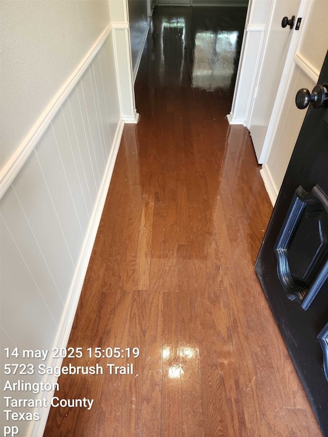 5722 Sagebrush Trl, Arlington, TX 76017 - corridor with hardwood / wood-style flooring and a decorative wall