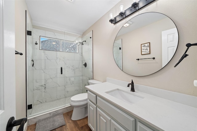 4270 Crooked Stick Dr, Frisco, TX 75035 - bathroom with a shower stall, vanity, and wood finished floors