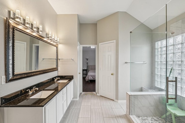8729 Somerville Way, Plano, TX 75025 - full bath featuring a tile shower, double vanity, plenty of natural light, and ensuite bath