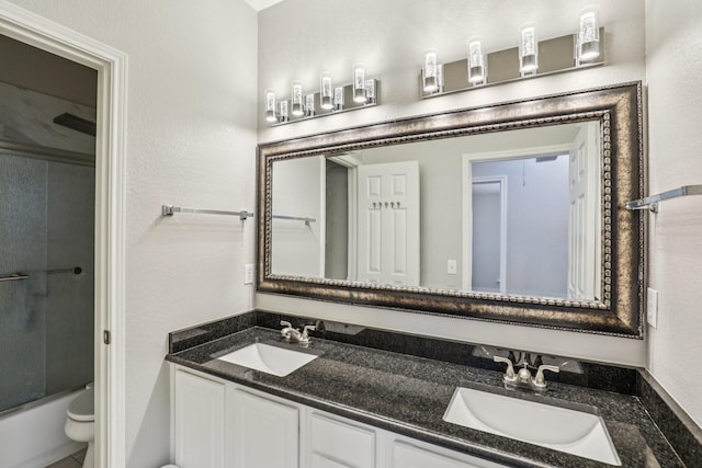 8729 Somerville Way, Plano, TX 75025 - full bath with double vanity and shower / bath combination with glass door