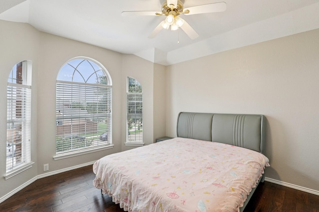 8729 Somerville Way, Plano, TX 75025 - bedroom with dark wood finished floors and a ceiling fan