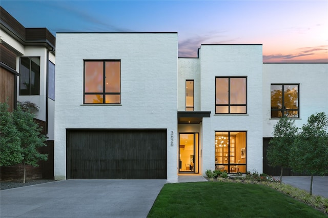 3626 Edgewater St, Dallas, TX 75205 - contemporary home featuring driveway, an attached garage, a yard, and brick siding