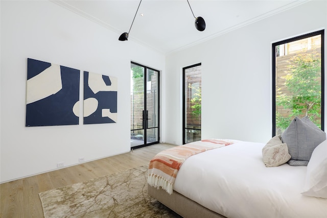 3626 Edgewater St, Dallas, TX 75205 - bedroom with access to exterior, crown molding, and wood finished floors