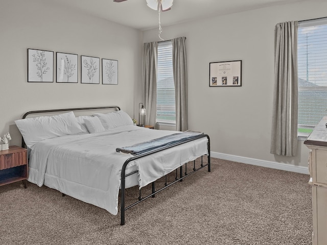 200 Tanager Dr, Rhome, TX 76078 - carpeted bedroom featuring baseboards and a ceiling fan
