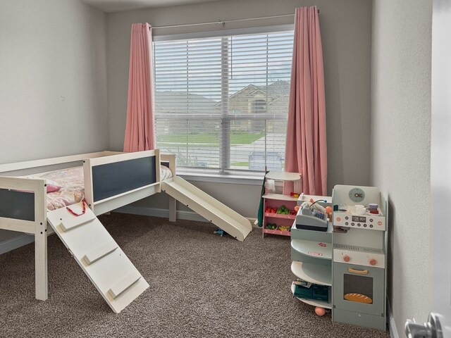 200 Tanager Dr, Rhome, TX 76078 - bedroom featuring carpet floors and baseboards