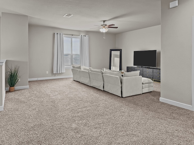 200 Tanager Dr, Rhome, TX 76078 - carpeted living room featuring a ceiling fan and baseboards