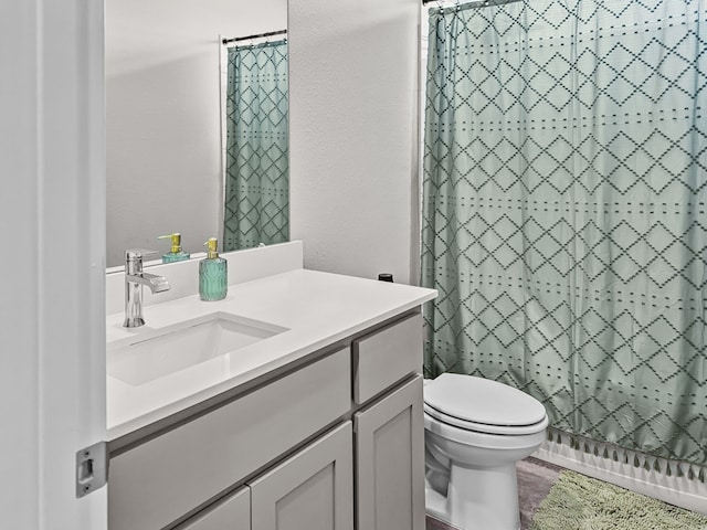 200 Tanager Dr, Rhome, TX 76078 - bathroom with vanity, a shower with shower curtain, a textured wall, and wood finished floors