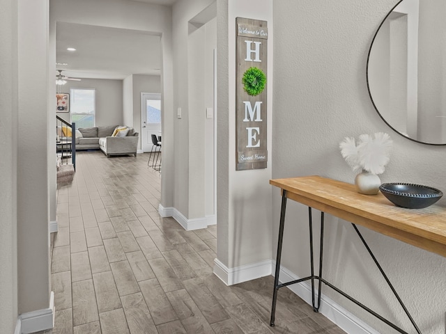 200 Tanager Dr, Rhome, TX 76078 - hallway with baseboards and wood finished floors