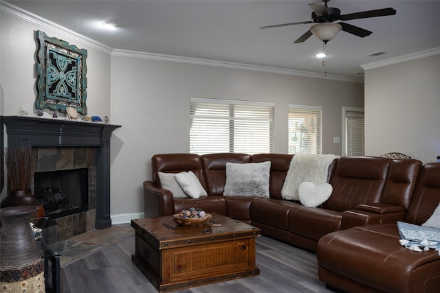 305 Shepherd Ln, Royse City, TX 75189 - living room with wood finished floors, crown molding, ceiling fan, and a tile fireplace