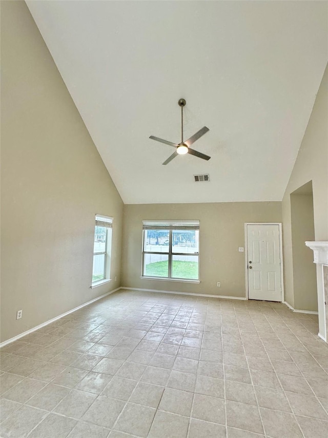 1736 Goodwin Dr, Providence Village, TX 76227 - spare room with high vaulted ceiling, ceiling fan, and light tile patterned floors