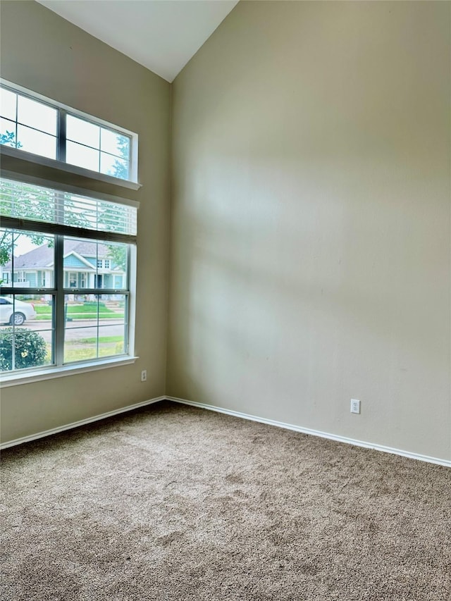 1736 Goodwin Dr, Providence Village, TX 76227 - empty room featuring carpet and vaulted ceiling