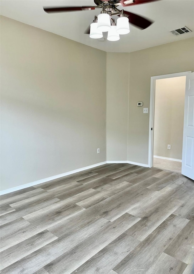1736 Goodwin Dr, Providence Village, TX 76227 - unfurnished room with wood finished floors and a ceiling fan