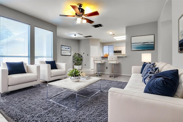 1403 Bosher Dr, Cedar Hill, TX 75104 - living room featuring a ceiling fan and baseboards