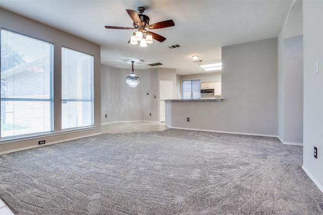 1403 Bosher Dr, Cedar Hill, TX 75104 - unfurnished living room with light colored carpet and a ceiling fan