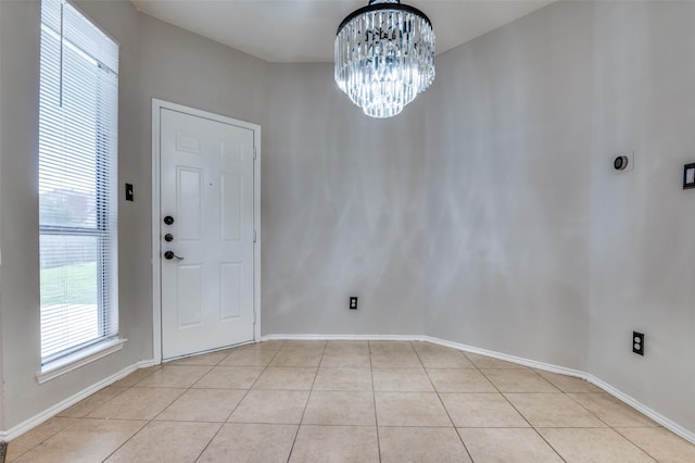 1403 Bosher Dr, Cedar Hill, TX 75104 - unfurnished dining area with a chandelier and light tile patterned floors