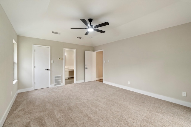 809 Havenwood Ln S, Fort Worth, TX 76112 - unfurnished bedroom with carpet floors, connected bathroom, and ceiling fan