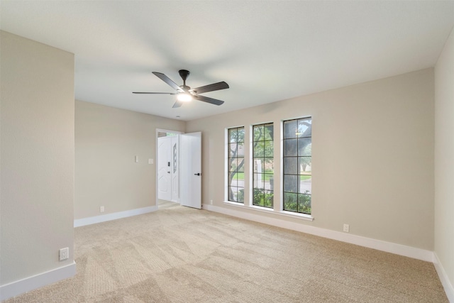 809 Havenwood Ln S, Fort Worth, TX 76112 - spare room featuring light carpet and ceiling fan