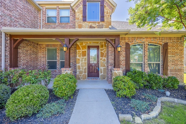 6913 Chisholm Trl, North Richland Hills, TX 76182 - entrance to property featuring brick siding and a porch