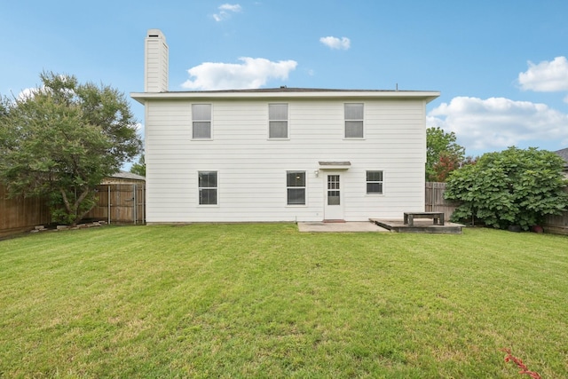 2705 White Pine Dr, Little Elm, TX 75068 - rear view of property featuring a fenced backyard, a patio area, and a chimney