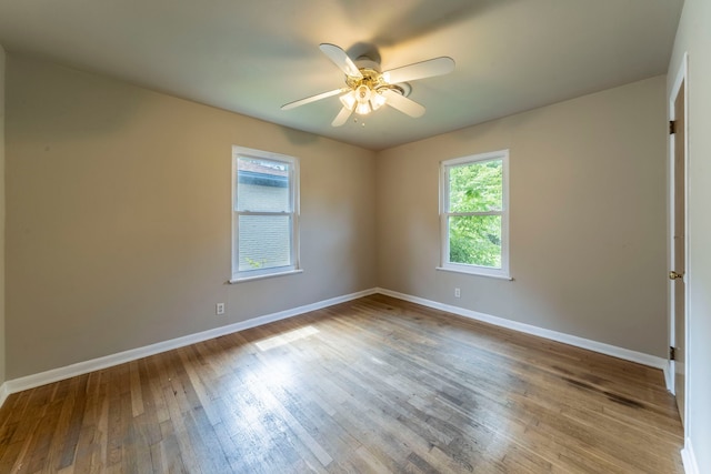 1022 Kings Row, Denton, TX 76209 - empty room with hardwood / wood-style floors and a ceiling fan