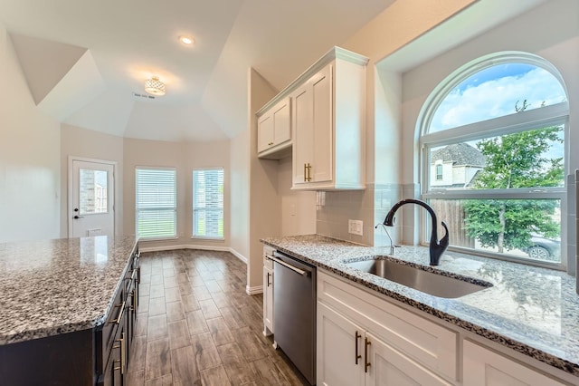 140 Godstone Ln, Prosper, TX 75078 - kitchen with dishwasher, plenty of natural light, white cabinets, light stone counters, and lofted ceiling