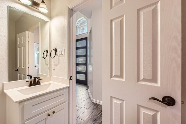 140 Godstone Ln, Prosper, TX 75078 - bathroom with vanity and wood finish floors