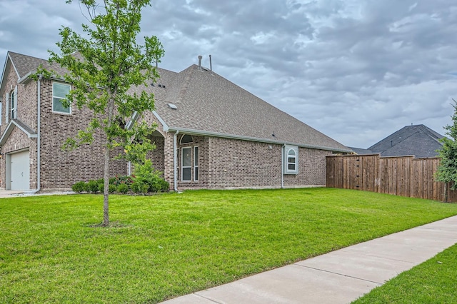 140 Godstone Ln, Prosper, TX 75078 - view of side of home featuring brick siding and roof with shingles