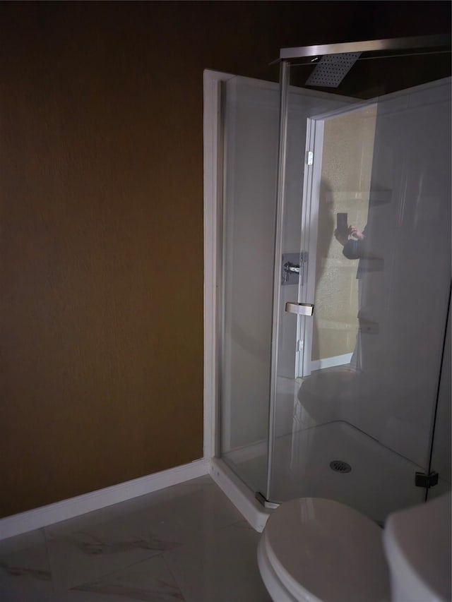 818 N Commerce St, Gainesville, TX 76240 - full bath with a stall shower and marble finish flooring