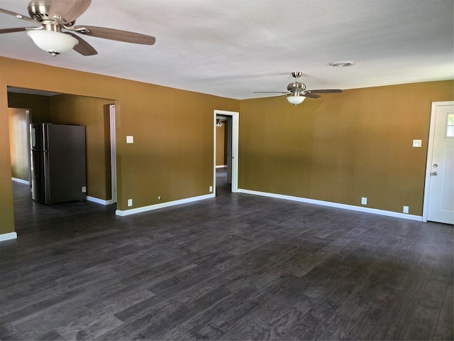 818 N Commerce St, Gainesville, TX 76240 - unfurnished room with ceiling fan and dark wood-style floors