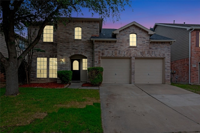 4133 Capstone Dr, Fort Worth, TX 76244 - french country style house with concrete driveway, a lawn, a garage, and brick siding