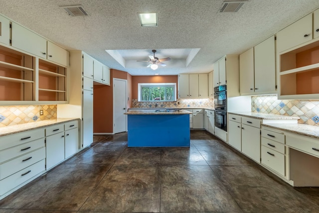 4524 Coyote Pt, Denton, TX 76208 - kitchen featuring open shelves, decorative backsplash, a center island, a ceiling fan, and a textured ceiling