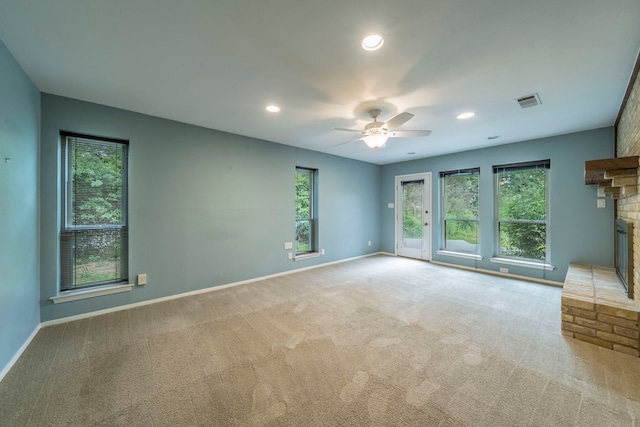 4524 Coyote Pt, Denton, TX 76208 - unfurnished room with ceiling fan, a fireplace, carpet floors, and recessed lighting