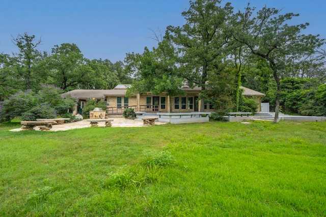 4524 Coyote Pt, Denton, TX 76208 - back of house with a patio and a yard
