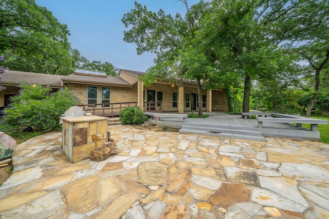 4524 Coyote Pt, Denton, TX 76208 - view of patio with a wooden deck and a grill