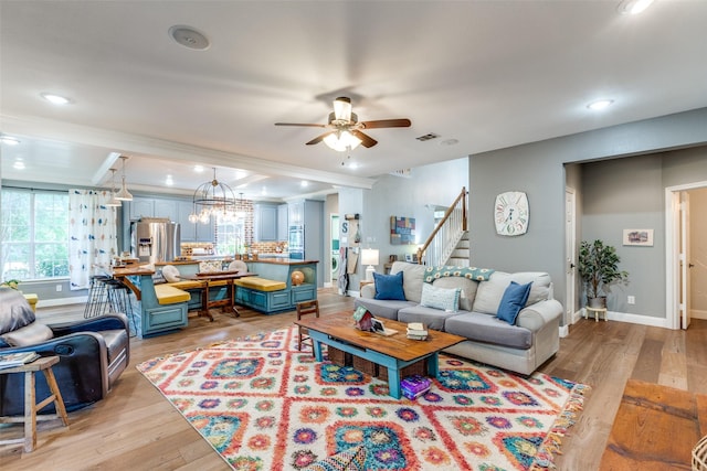 200 Stone Hollow Ct, Prosper, TX 75078 - living room featuring a ceiling fan, light wood-style floors, stairway, ornamental molding, and recessed lighting