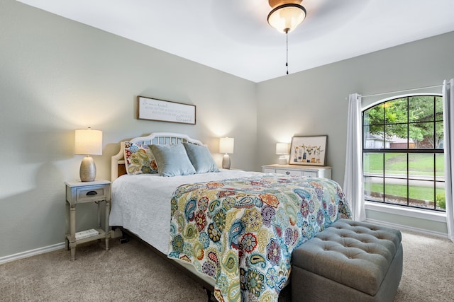 2301 Coleshire Dr, Plano, TX 75075 - carpeted bedroom with baseboards and ceiling fan